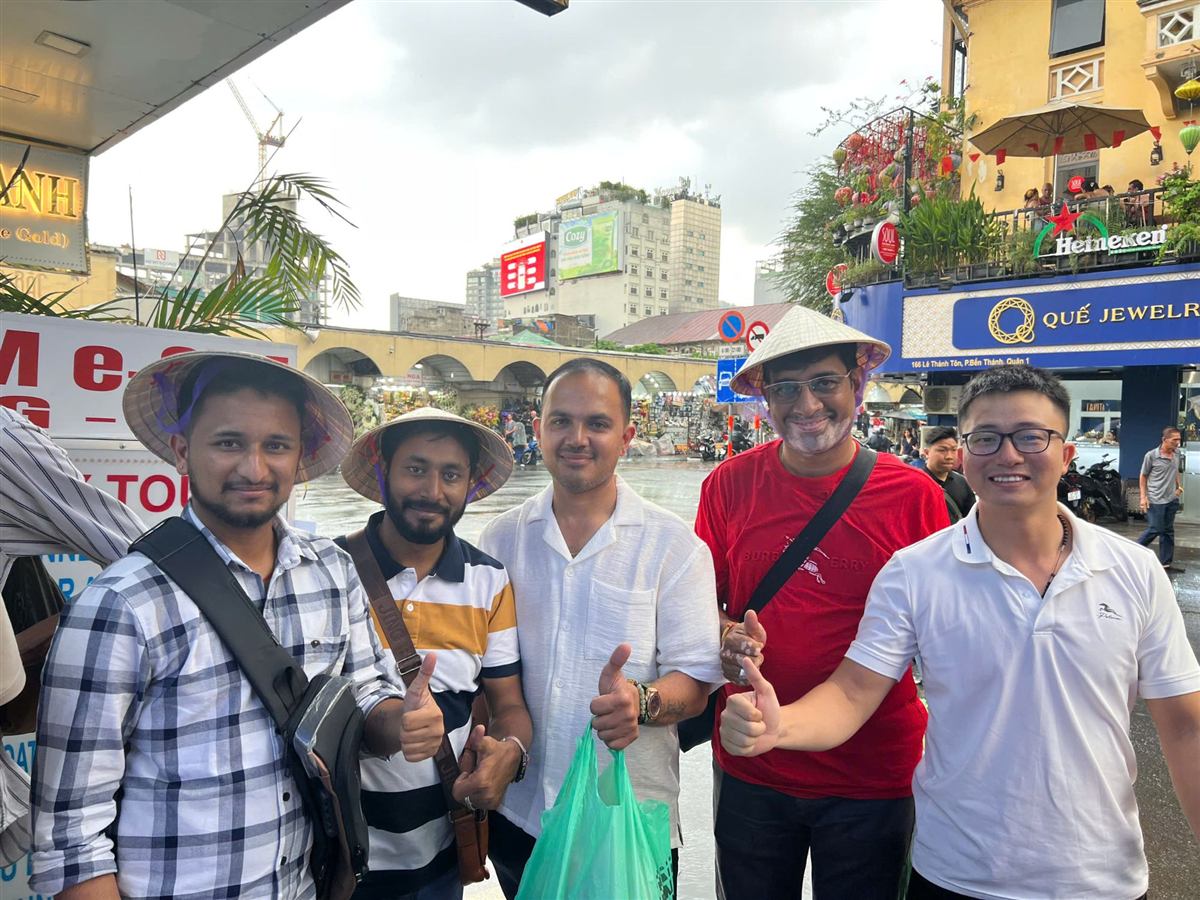 Guests with our staff near Ben Thanh Market